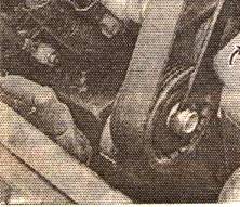 Устраните натяжение ремня повернув по часовой стрелке