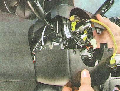 Снимите верхнюю и нижнюю части кожуха 