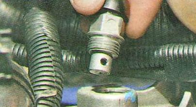 Замена масла в КПП Авео Шевролет