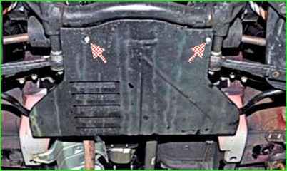 Removing the oil pan guard and engine splash guard