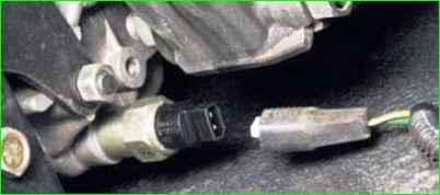 Sustitución del interruptor de luz de marcha atrás