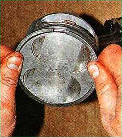 How to assemble the connecting rod and piston group ZMZ-406