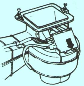 Отжать накидной хомут и вытащить плату вниз