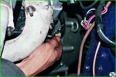 Extracción del colector de escape 