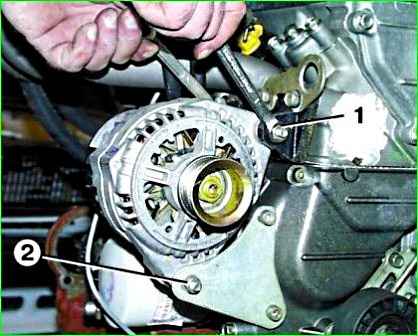 Removing the generator of the car GAZ-2705