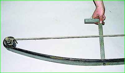 Desmontaje y reparación del resorte delantero GAZ-2705