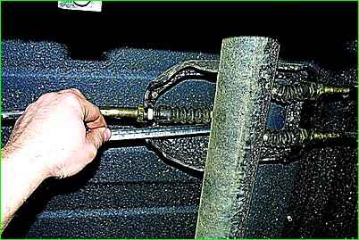 Ajuste del accionamiento del freno de estacionamiento