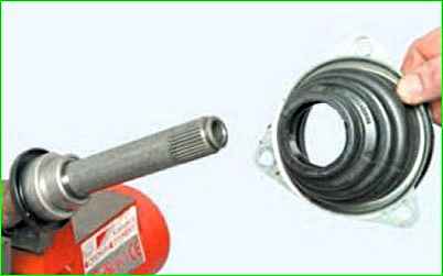 Sustitución de la funda y cojinete de la bisagra interna de la tracción izquierda