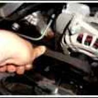 Tensioning the drive belt Niva Chevrolet